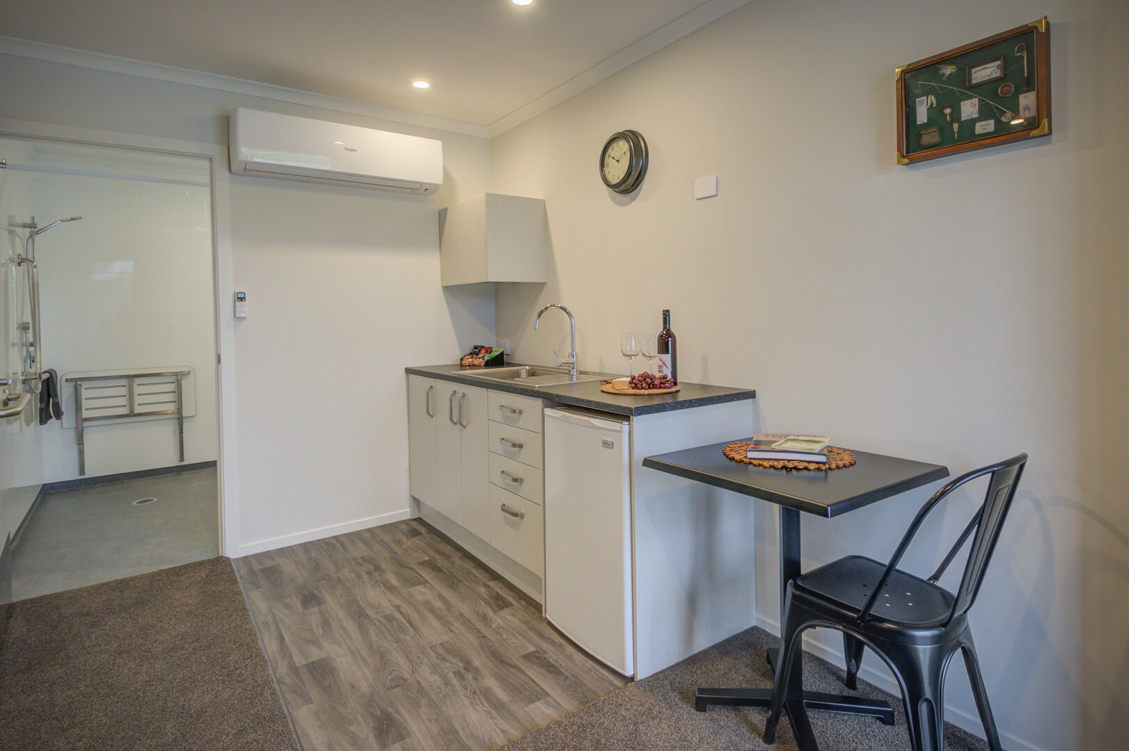 Kitchenette and dining area of one-bedroom accessible suite